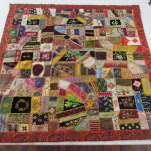 This quilt is like a waltz in fabric and stitches.....
