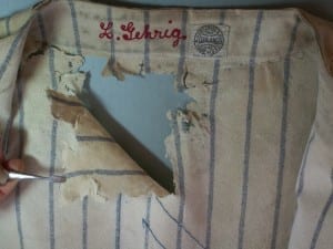 Conservation treatment of a large hole in Lou Gehrig's baseball jersey.