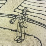 A fiber wall hanging depicting a standing human figure outlined in dark cord.