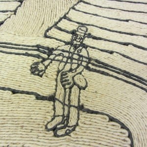 A fiber wall hanging depicting a standing human figure outlined in dark cord.