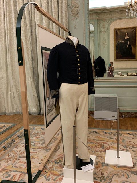 jacket and pants on display